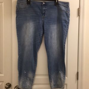 Distressed at the ankle light blue denim pants